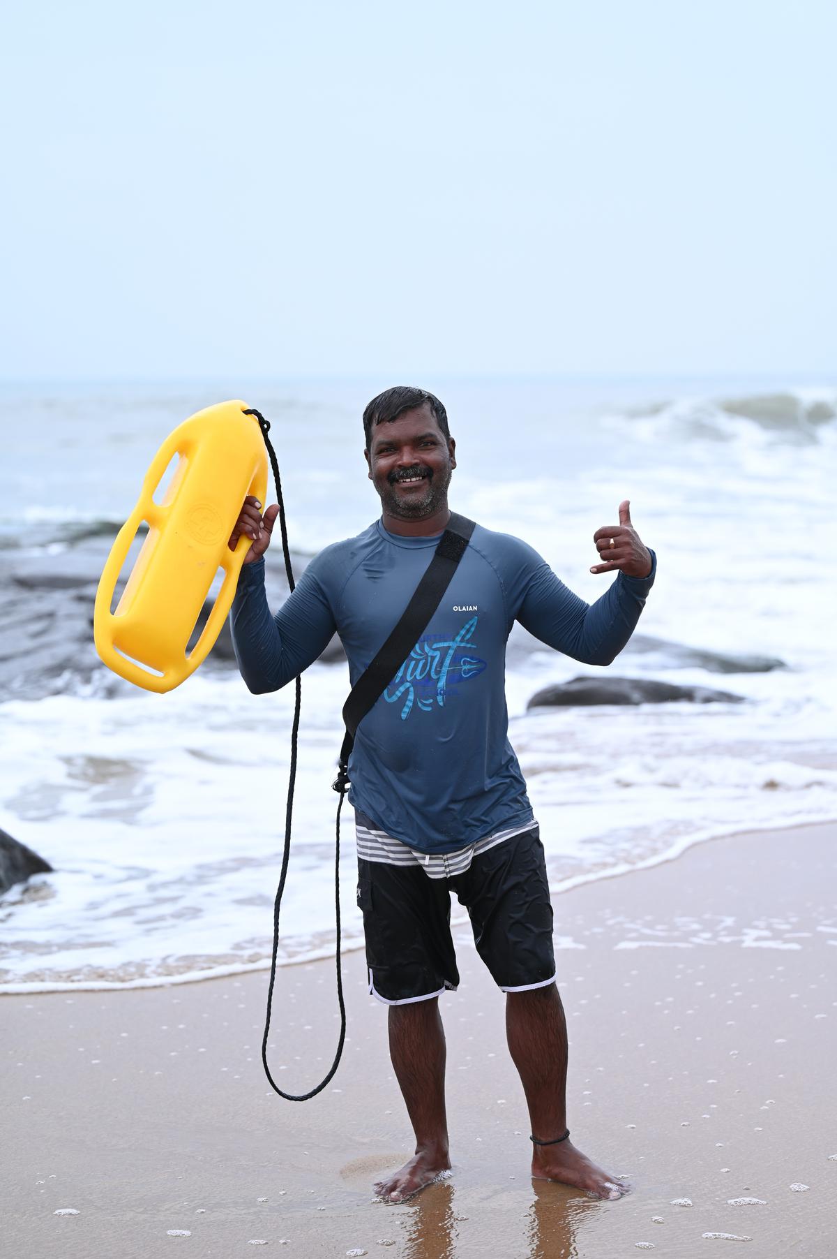 Murthy with his yellow buoy used for swimmers just about picking the sport up.