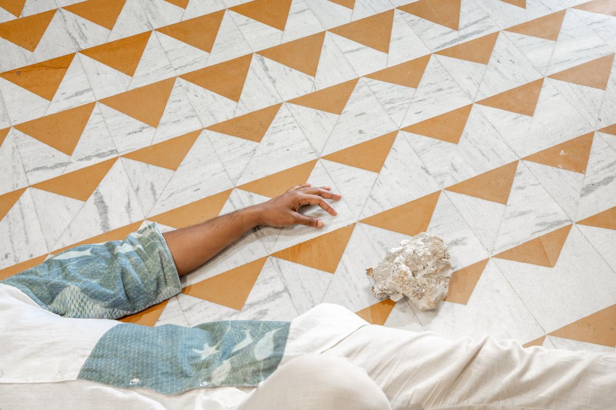 Marble inlays in the master bedroom representing the waves