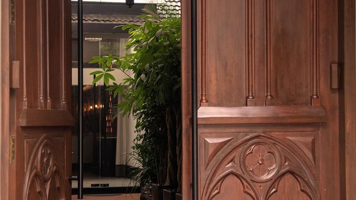 Architect Faisal Manzur has designed wooden doors at The Entrance Café and Pandan Club