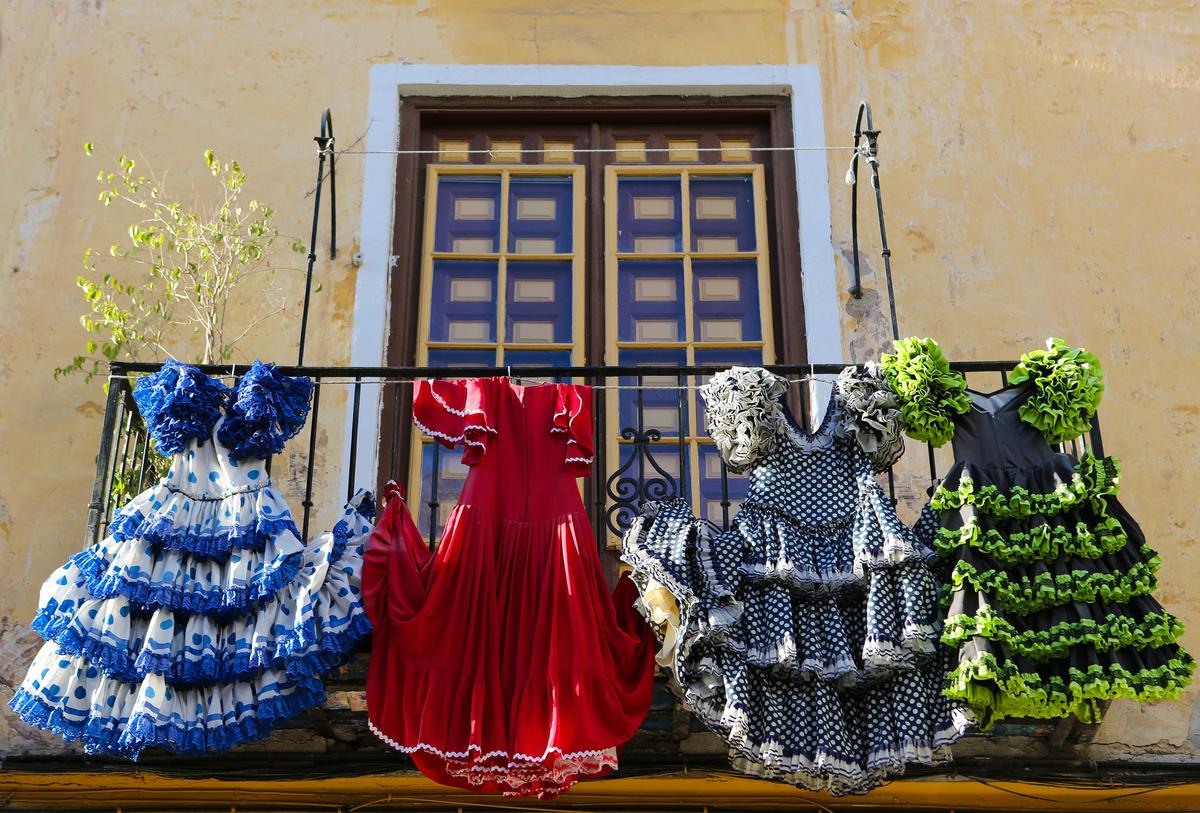 Traditional flamenco dresses at a house in Malaga, Andalusia, Spain.