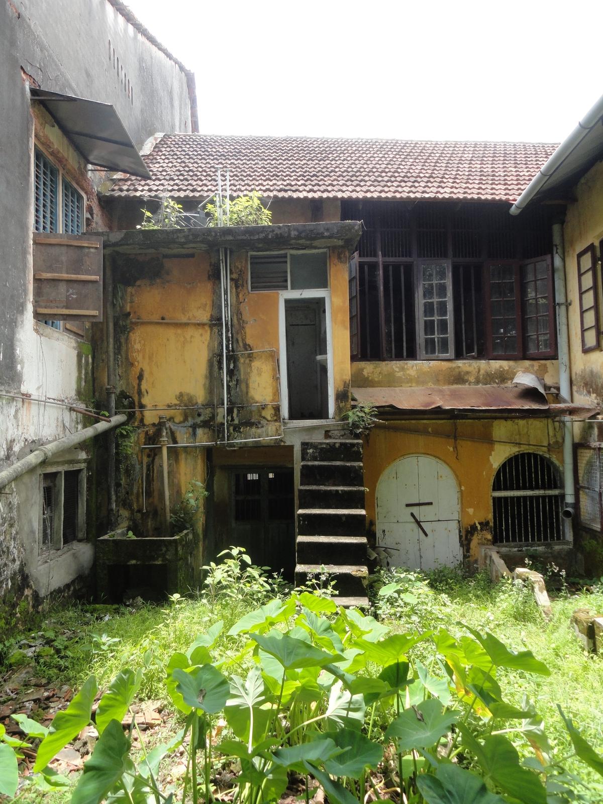 A photo of the home-turned-boutique hotel before the restoration process