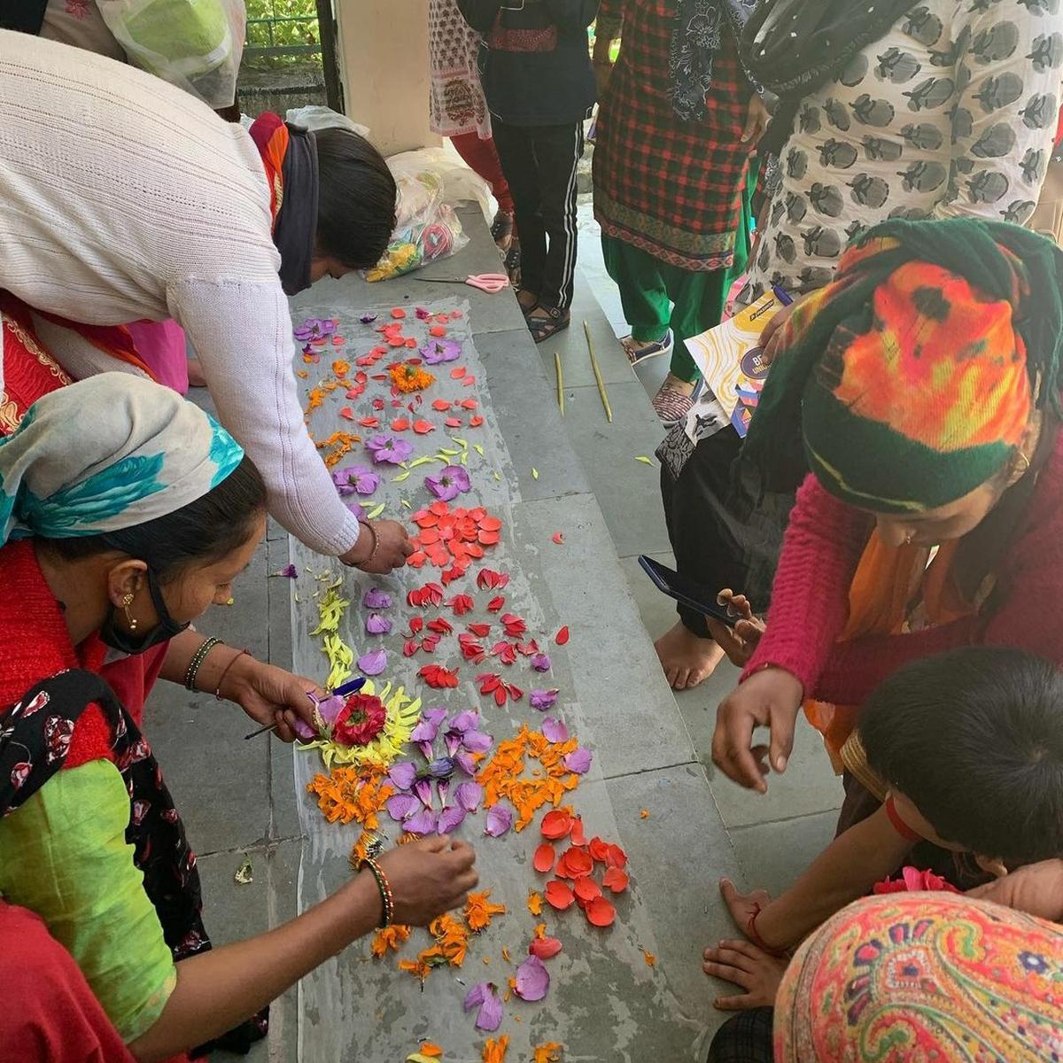 Women sorting flowers at Mulya’s facility