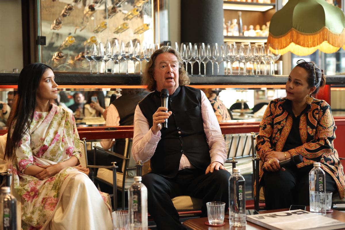 James (centre) at the book’s launch James (centre) at the book’s launch
