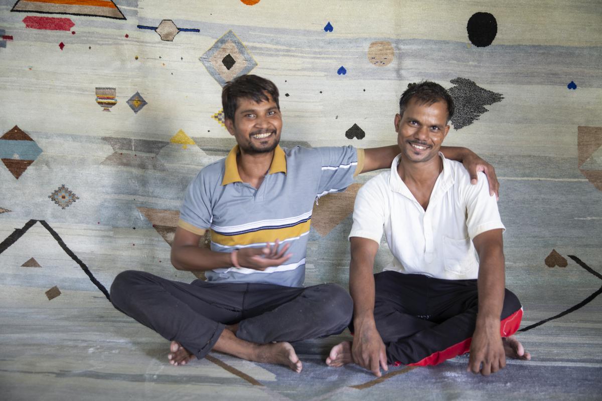 Weavers with their creation