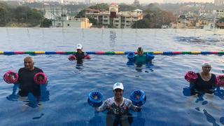 Pooja Zeuch keeps numbers low for physical distancing at her aqua aerobics class 
