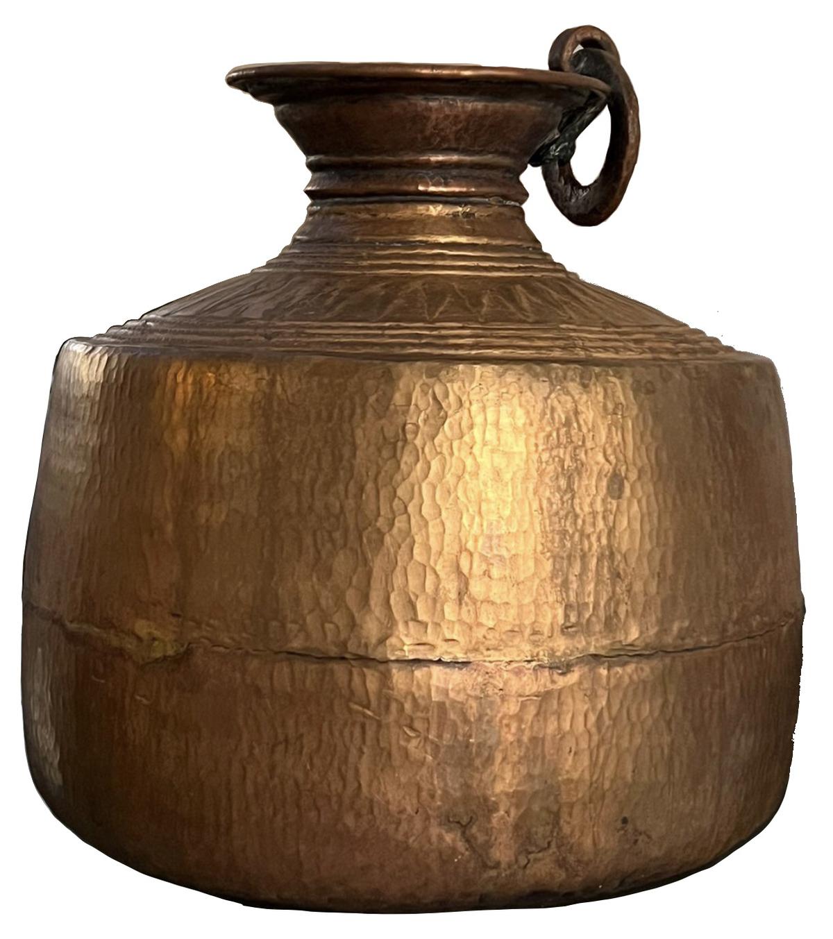 Beaten copper pot