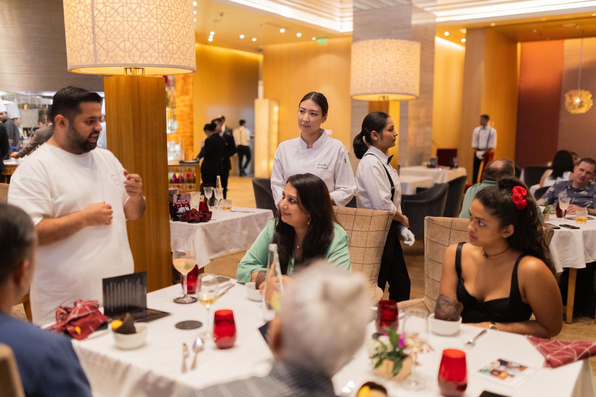 (from left) Varun talking to guests at The Ritz-Carlton, Bengaluru.