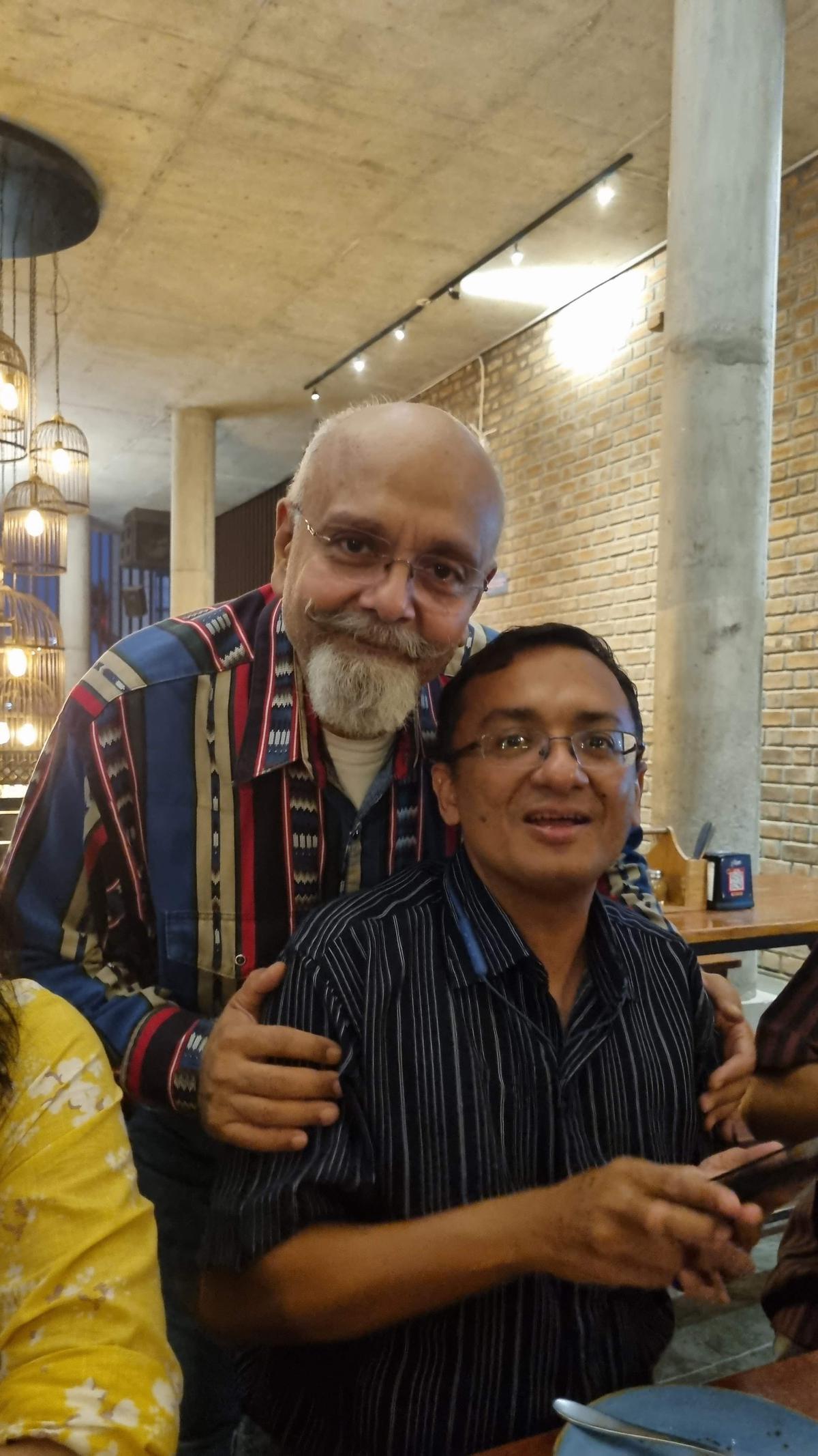 (from left) Devesh Agarwal and Nimish Gupta, founding members of the group at lunch