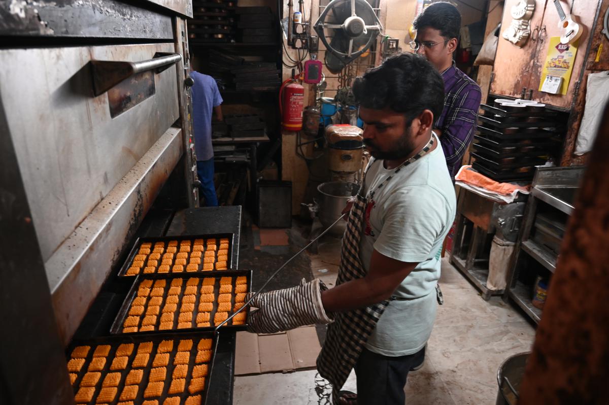 Venkatesh S checks a fresh batch of cookies