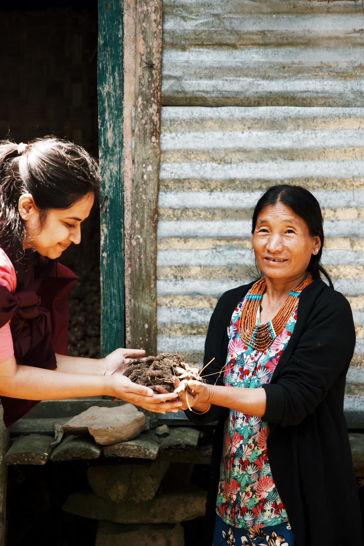 Chef Vanshika Bhatia of OMO Cafe with a local in Mon district, Nagaland