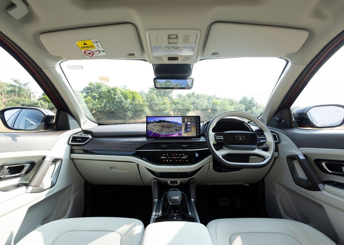 Tata Harrier petrol variant showcasing its contemporary cabin with lighter interior themes and modern technology.