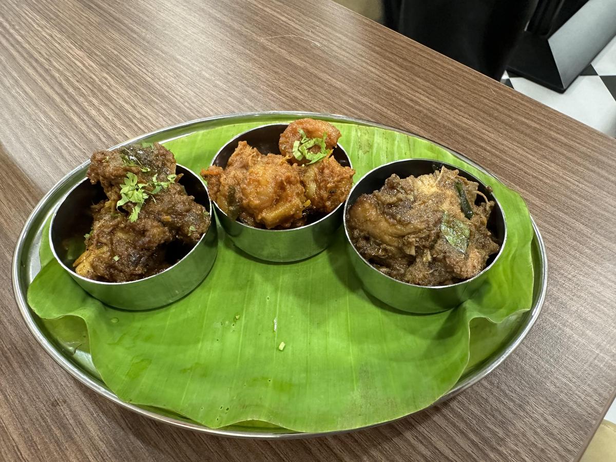 Chettinad-style boneless mutton chukka and Chicken chukka and Andhra-style prawn gravy with mango