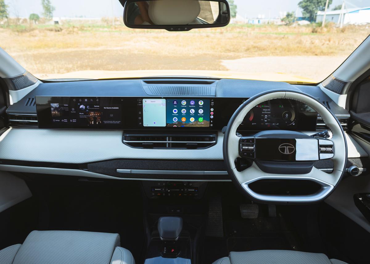 A minimalist, premium cabin features a seamless triple-screen layout that transforms every journey A minimalist, premium cabin features a seamless triple-screen layout that transforms every journey