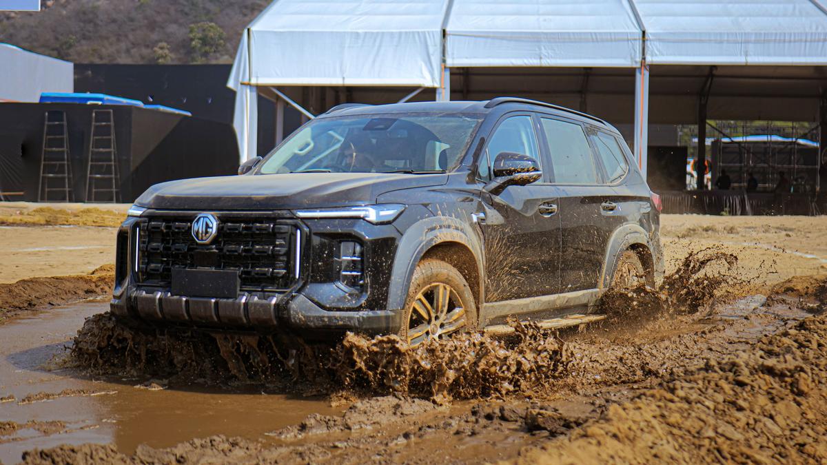 Muscular side profile highlighting its upright stance and large alloy wheels Muscular side profile highlighting its upright stance and large alloy wheels