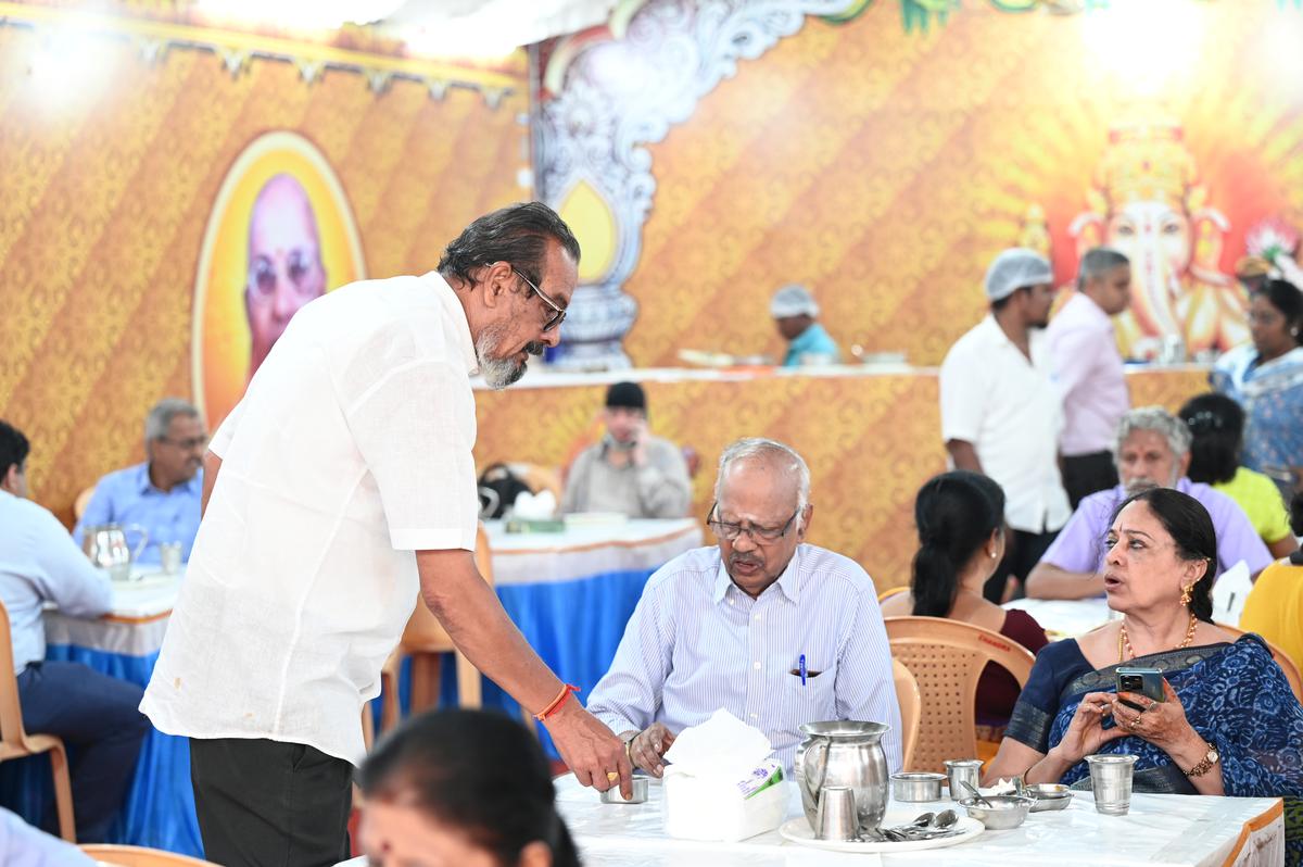 K. Ramesh of Sri Saasthalaya Catering Service serving his guests at Nardha Gana Sabha