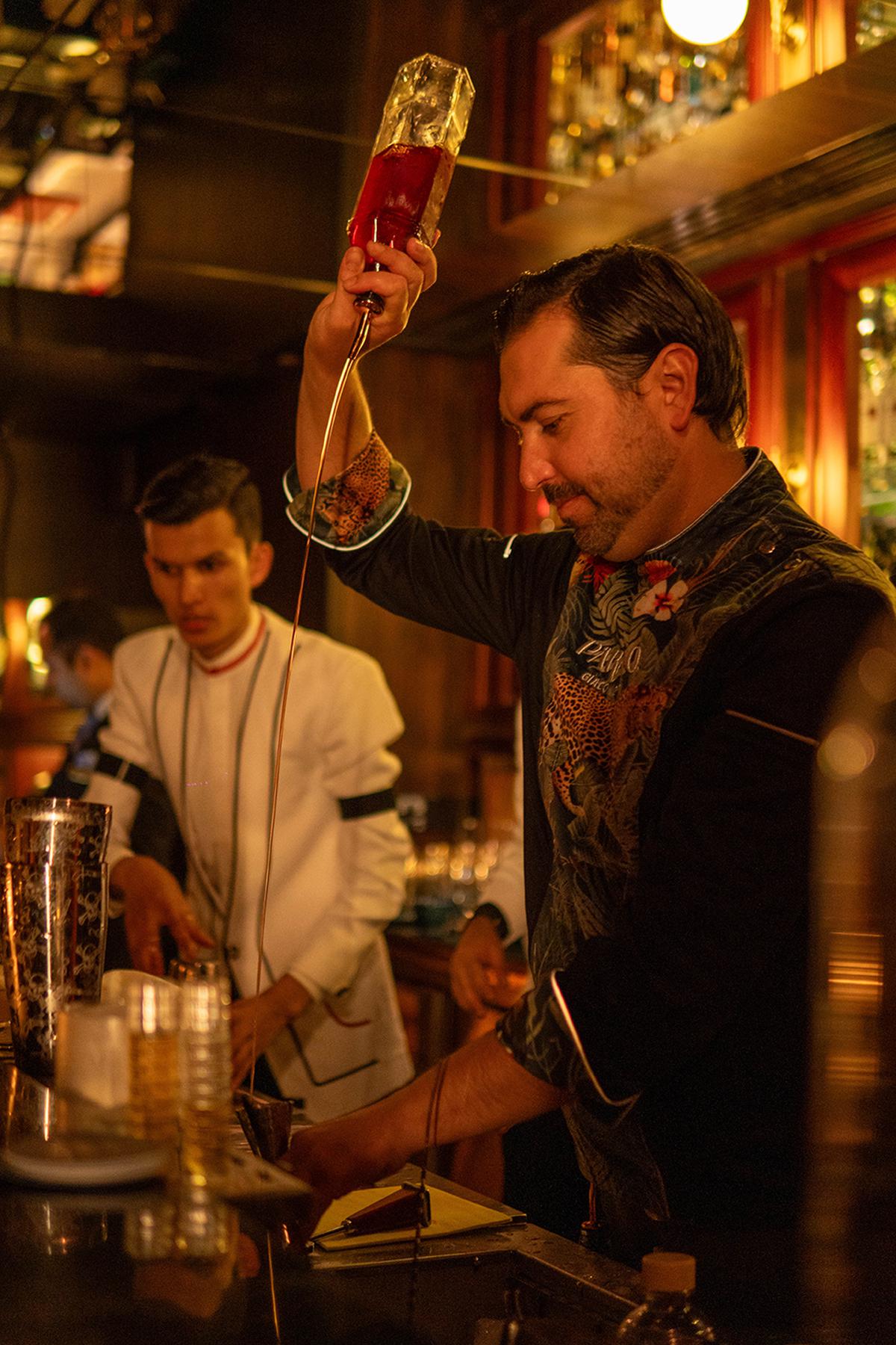 Giacomo Giannotti making a drink at ZLB23, a Kyoto Speakeasy at The Leela Palace, Bengaluru