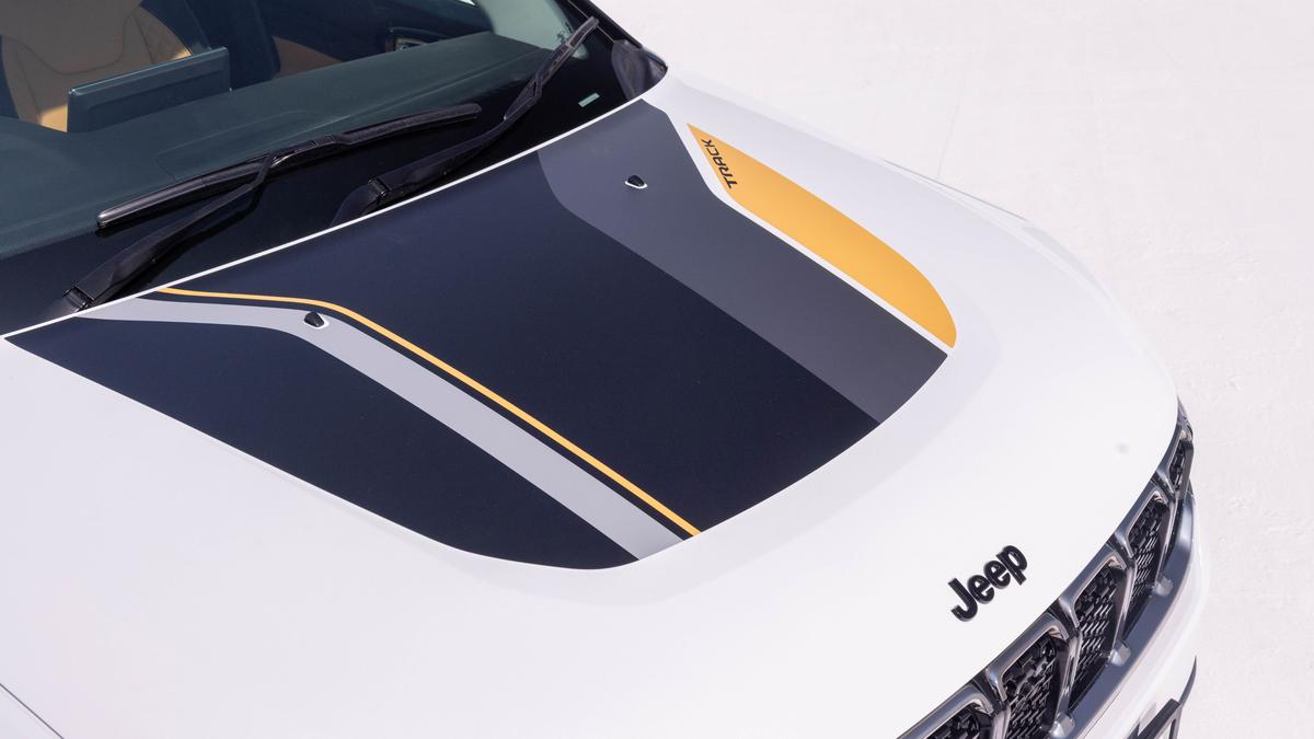 The Jeep Meridian Track Edition stands out with piano black accents, espresso-finish grille detailing and exclusive badging The Jeep Meridian Track Edition stands out with piano black accents, espresso-finish grille detailing and exclusive badging