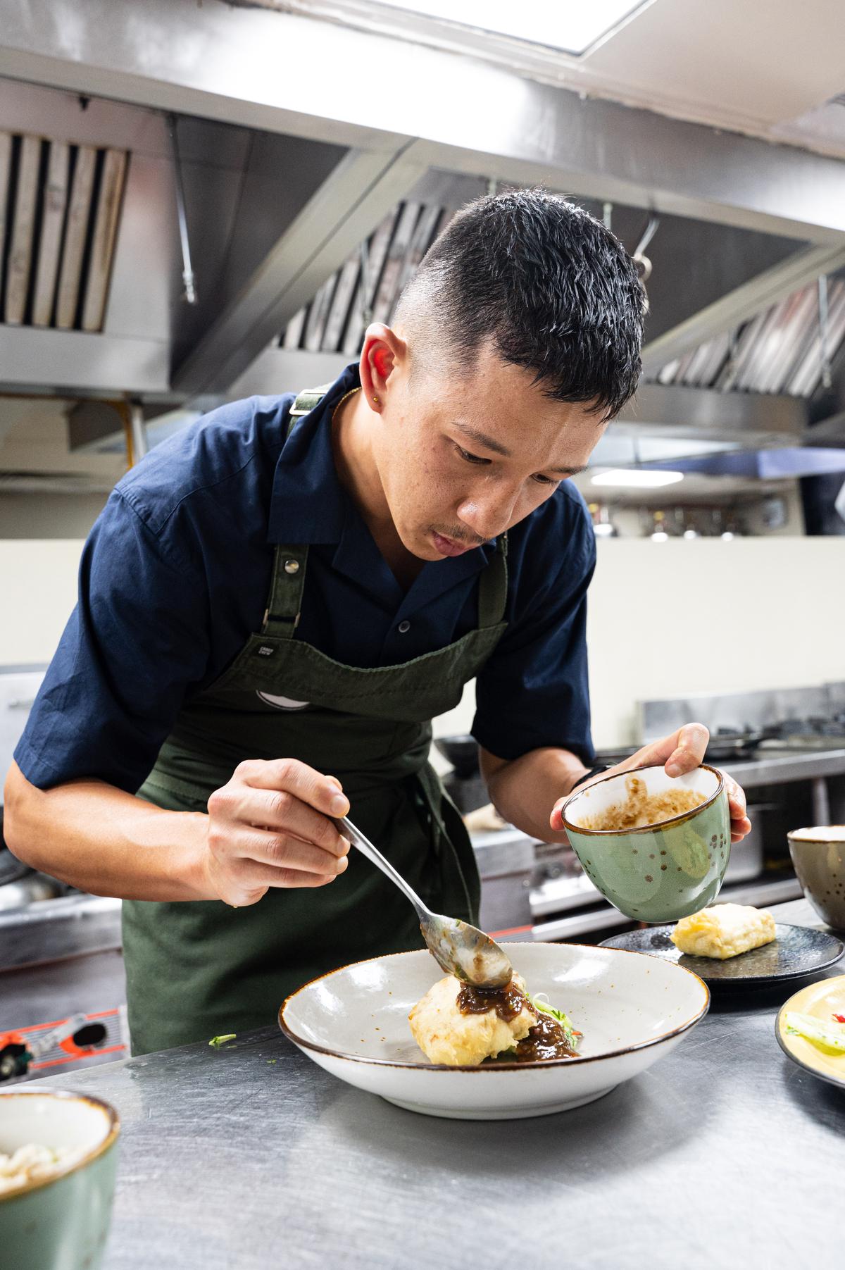 Chef Brendan Pang in the kitchen at The Leela Palace, Bengaluru