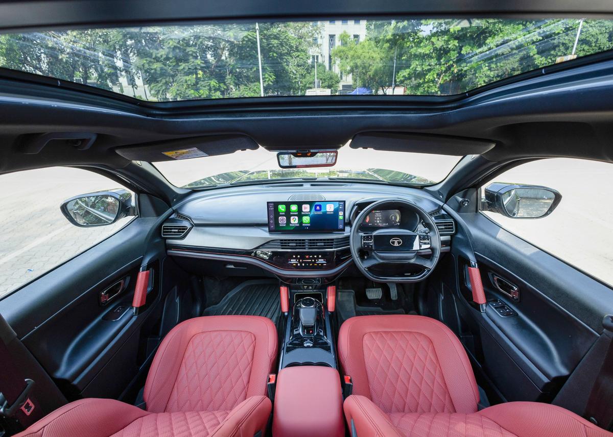 Tata Safari petrol interior with rich, dramatic cabin colours and spacious seating for families.