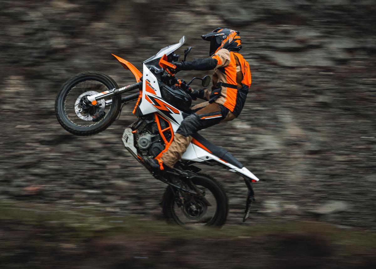 The KTM 390 Adventure R features a rugged, rally-inspired design tailored for off-road adventure