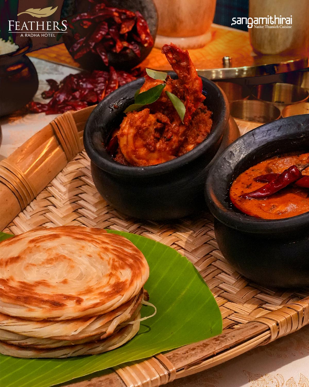 Parotta with accompaniments Parotta with accompaniments