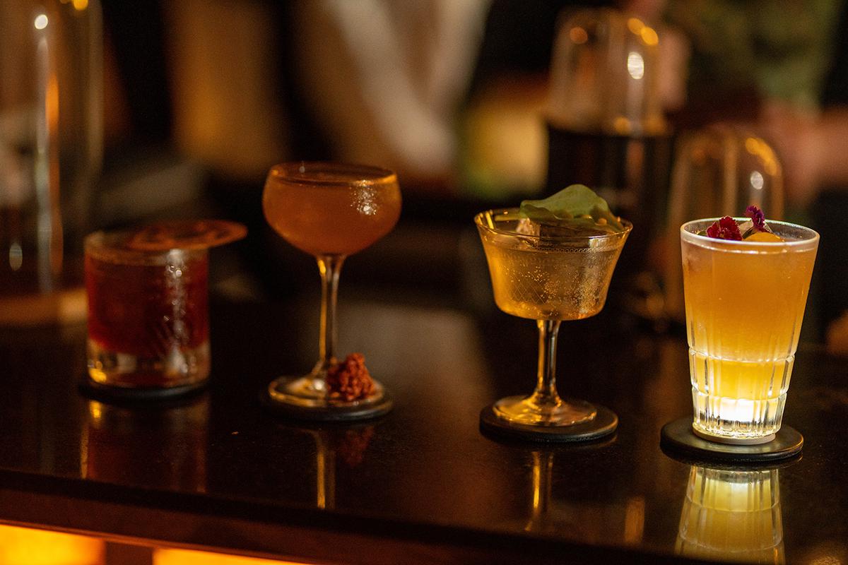 (from left) Evolution Negroni, The Copper, Sea Heart and Tesla cocktails were served at the Paradiso bar takeover at ZLB23, a Kyoto Speakeasy at The Leela Palace, Bengaluru