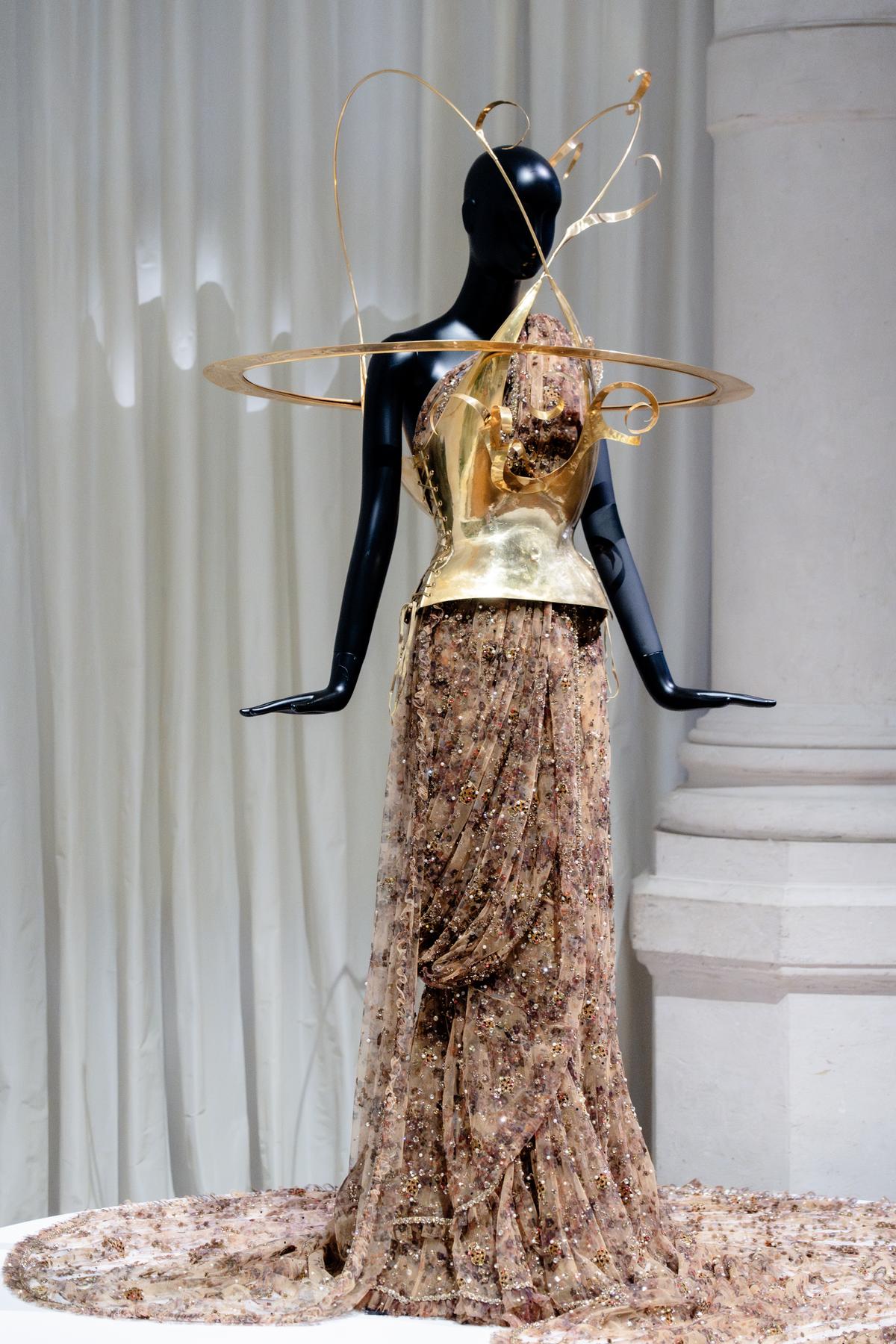 The iconic Sabyasachi sari with a Schiaparelli sculptural bodice The iconic Sabyasachi sari with a Schiaparelli sculptural bodice