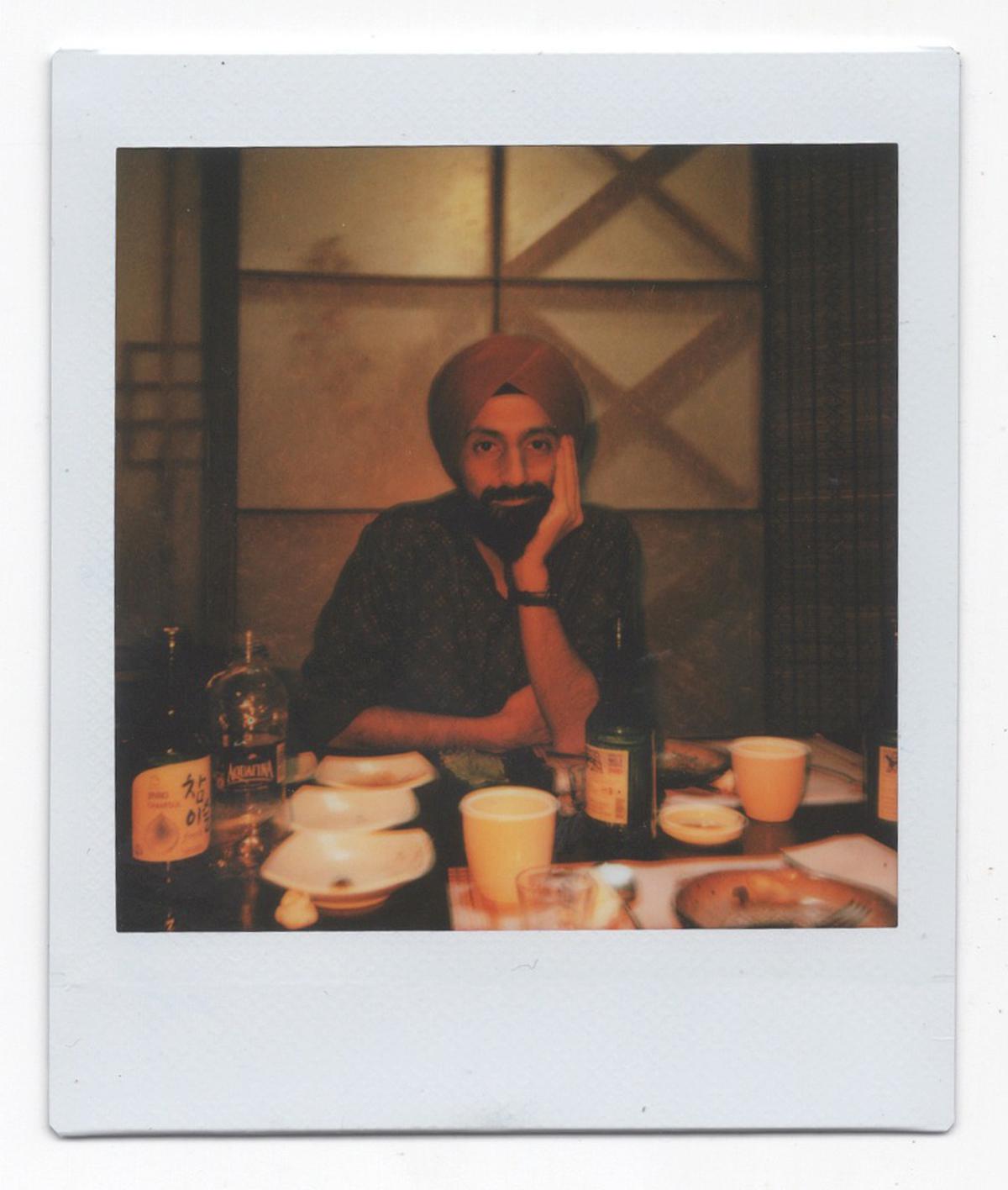 Karanjit Singh’s portrait clicked on an instant film camera