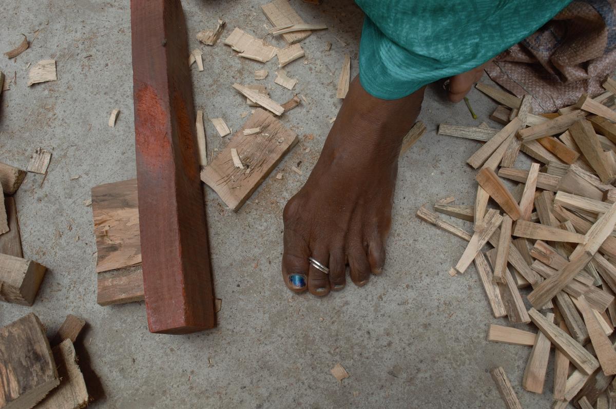 How years of chopping treenails has affected the feet