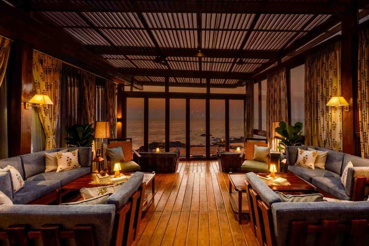 Cute corners, plush sofas and warm lighting create a cozy space at After Dinner that overlooks the Arabian sea 