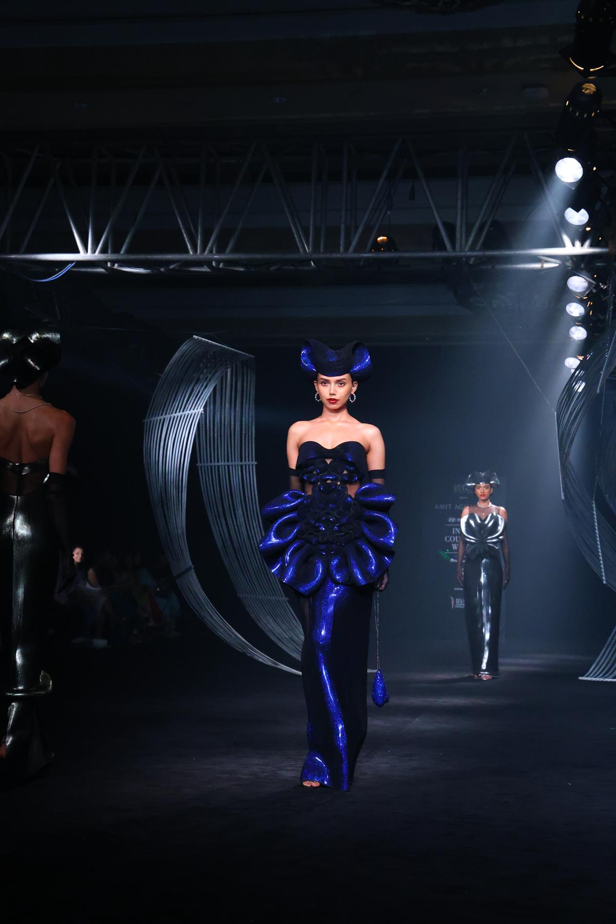 Models walked the runway in futuristic pieces that referenced his fascination with science, philosophy and cosmology.