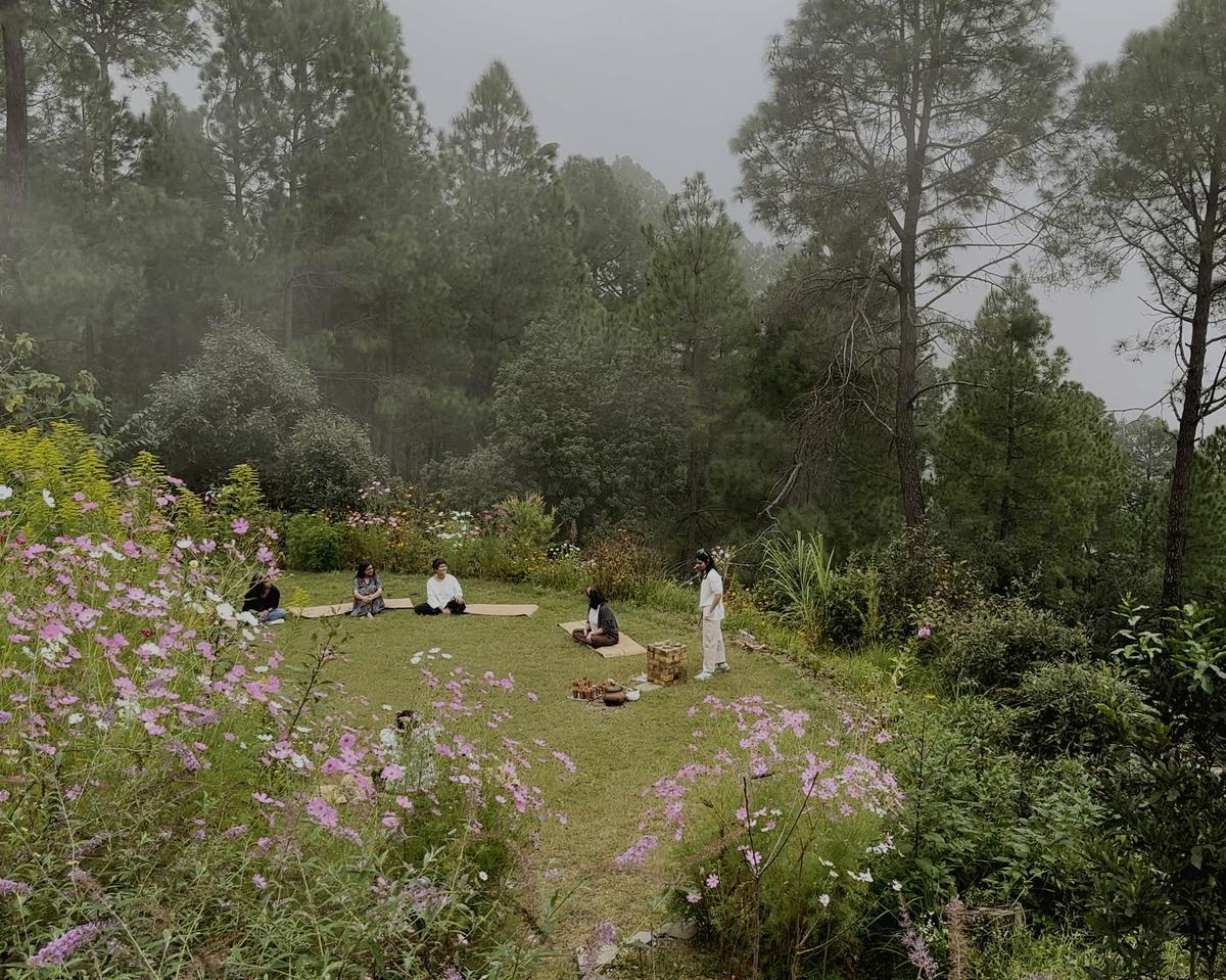 Guests getting ready for a cacao ceremony on a misty morning.