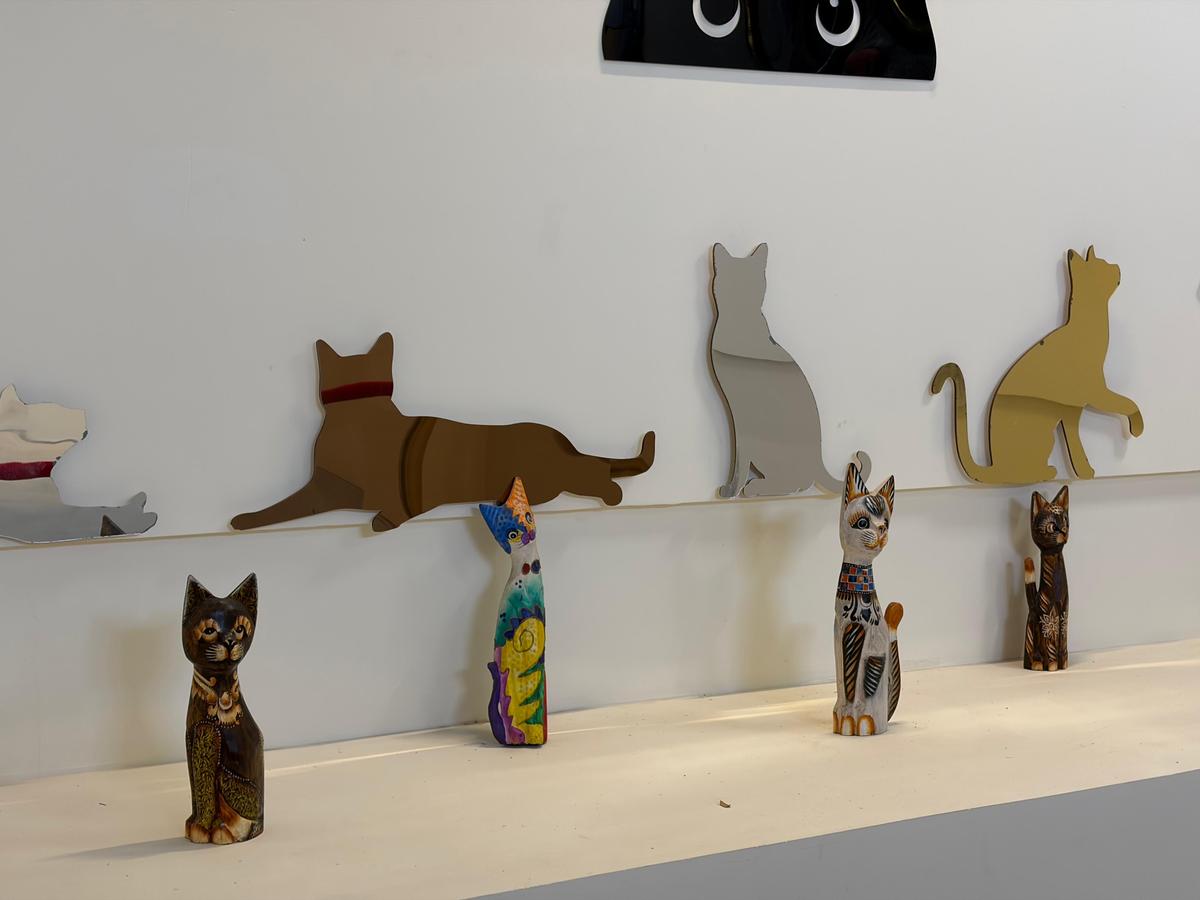 The musuem has a diverse array of cat artefacts and art