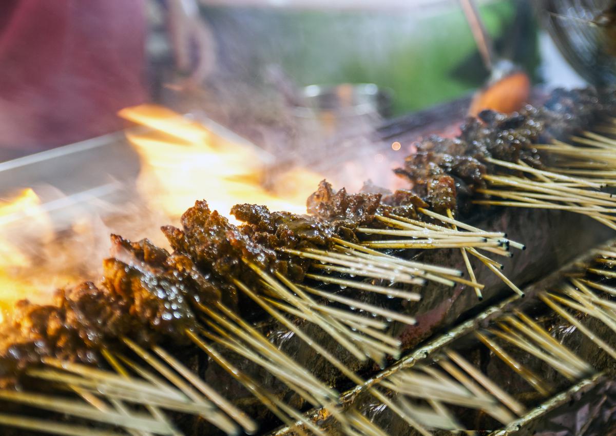 Chicken satay at a night market in Singapore