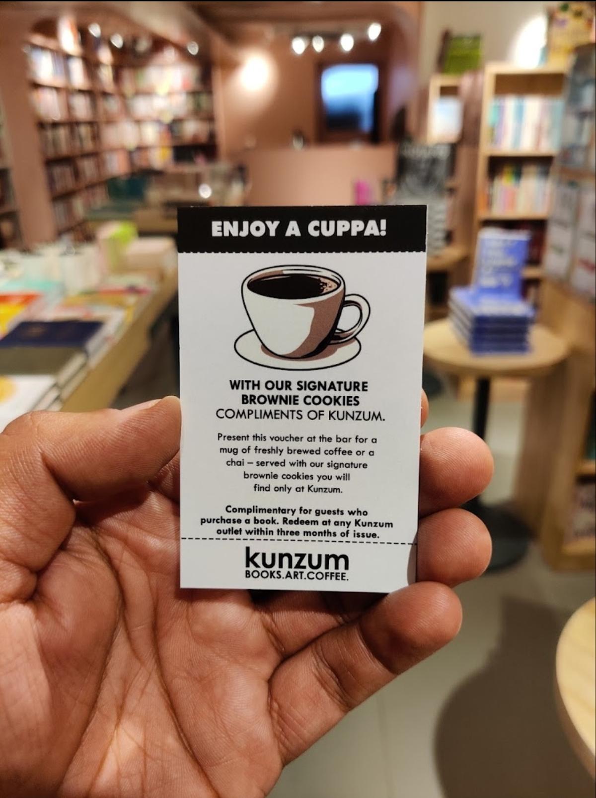 Coffee coupon after a purchase of book in Kunzum Travel Café, New Delhi.