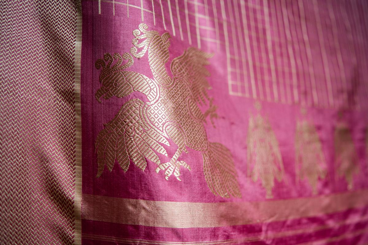 A revived Royal Mysore sari featuring the Ganda Berunda motif in silk on a lac-dyed silk body, woven on an Adai loom by Gayathri K.K. A revived Royal Mysore sari featuring the Ganda Berunda motif in silk on a lac-dyed silk body, woven on an Adai loom by Gayathri K.K.