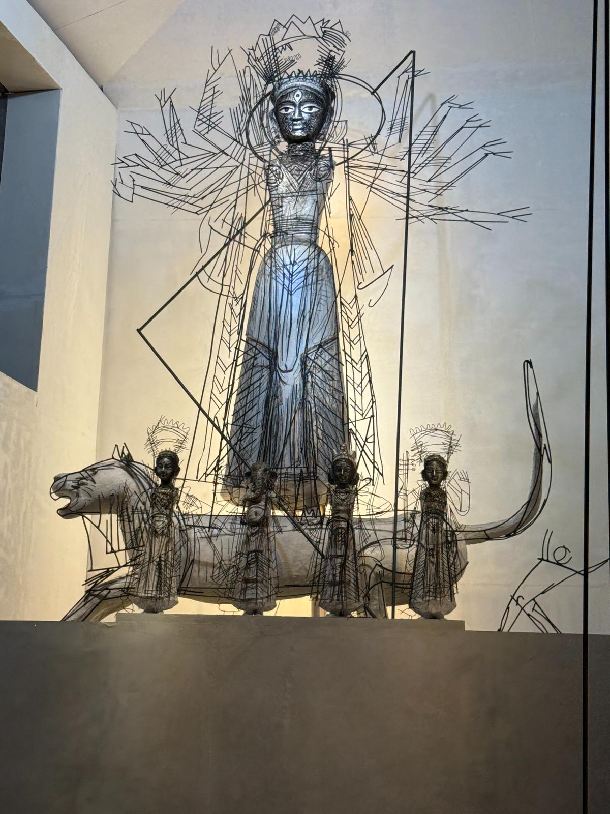 A metal Durga at Beliaghata 33 Palli’s Roti Kapda Makhan pandal 