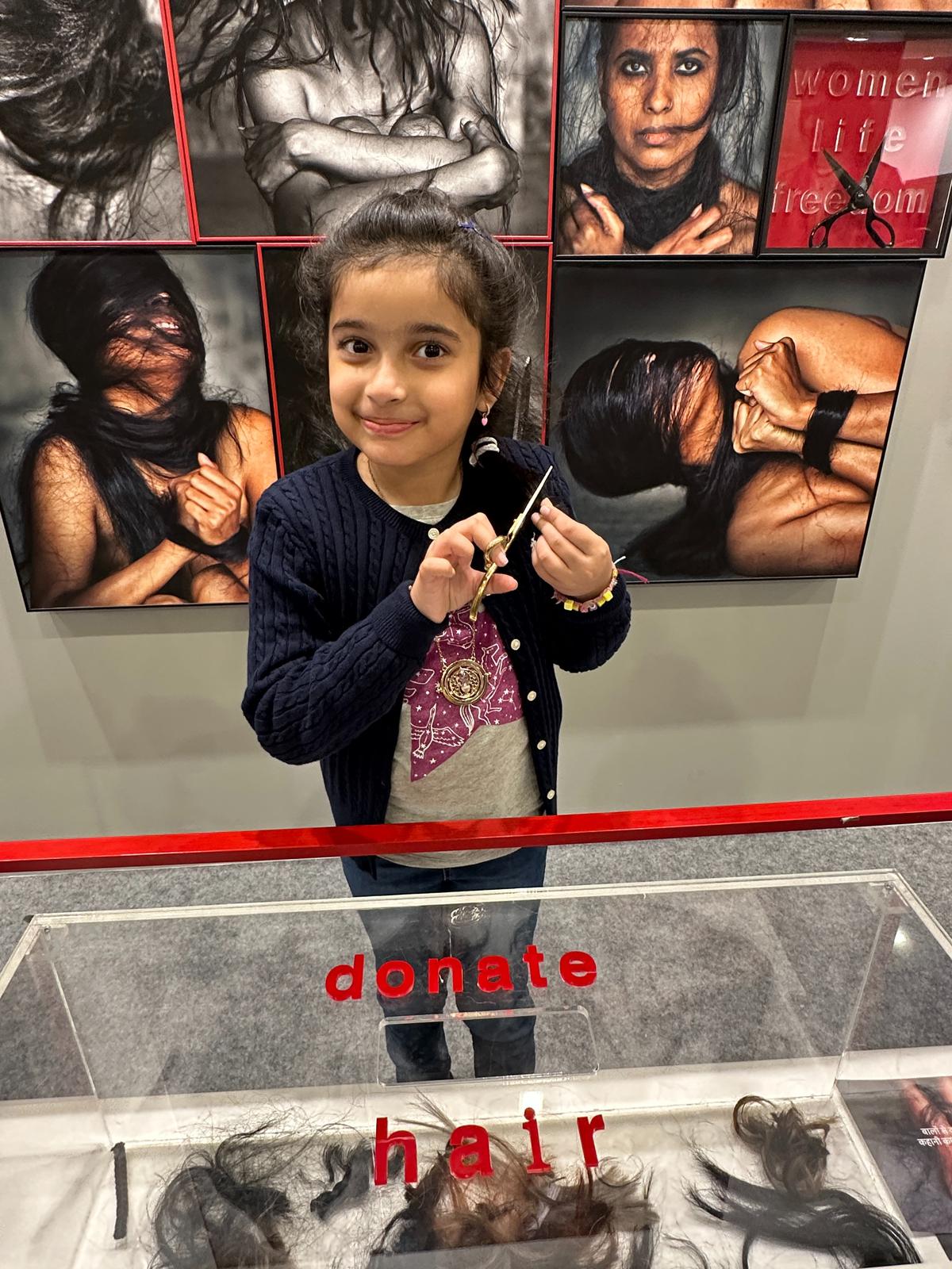 A little girl donating her hair