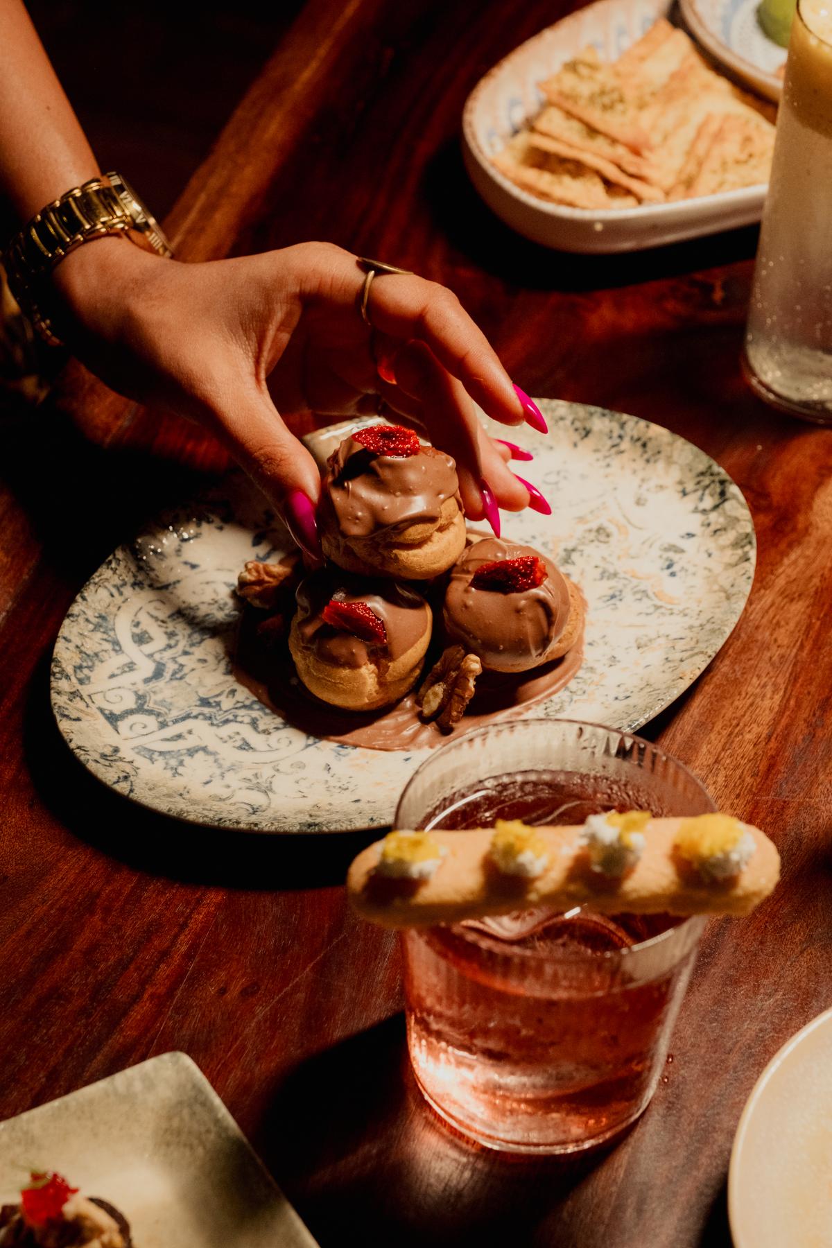 Milk chocolate ganache & walnut profiteroles pack a flavourful punch 