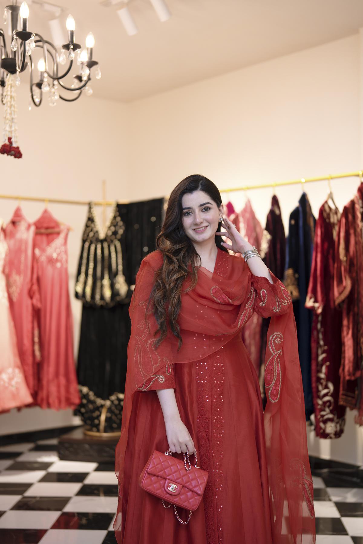 The red dori-embroidered anarkali set with a block print palazzo and matching embroidered organza dupatta