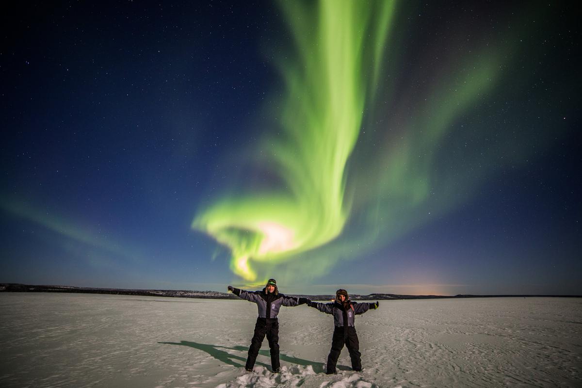 Under the Aurora Borealis in Rovaniemi, Lapland, Finland; Photo: Juho Uutela