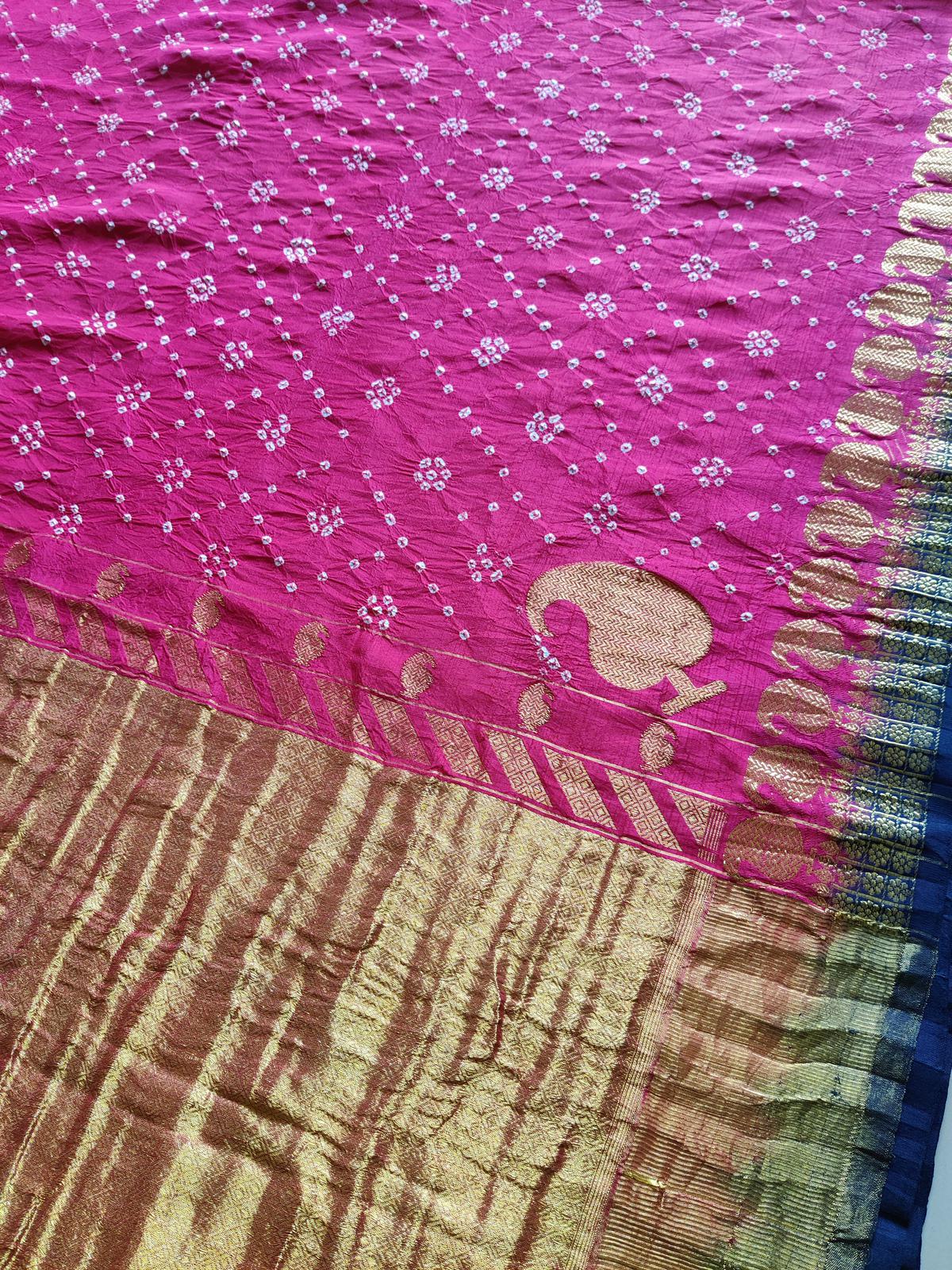 A recreation of the Sungudi saree from Victoria and Albert museum archives, with bandhani work and corner mango patterns by Yatri Weaves 