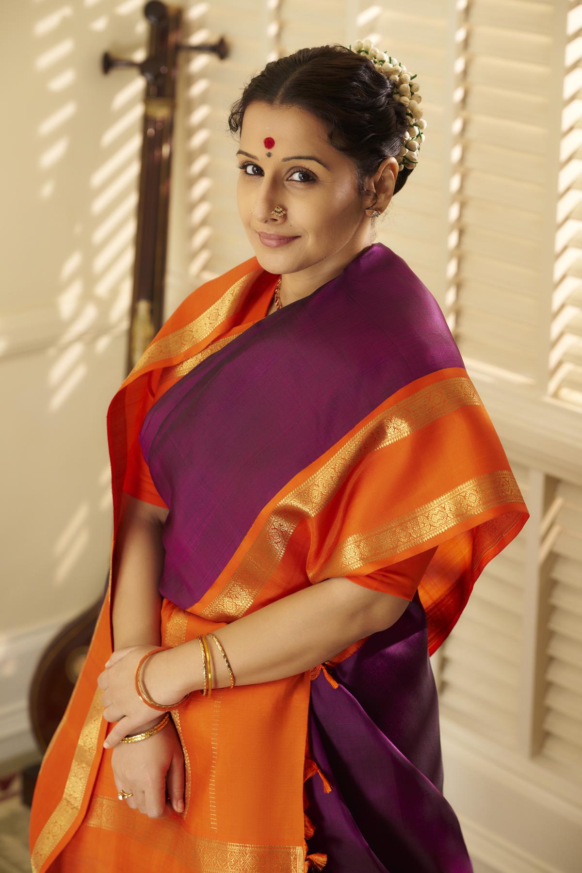   In a recreation of the magenta sari with an orange border worn by M S Subbulakshmi for The Music Academy Sadas in 1968                             