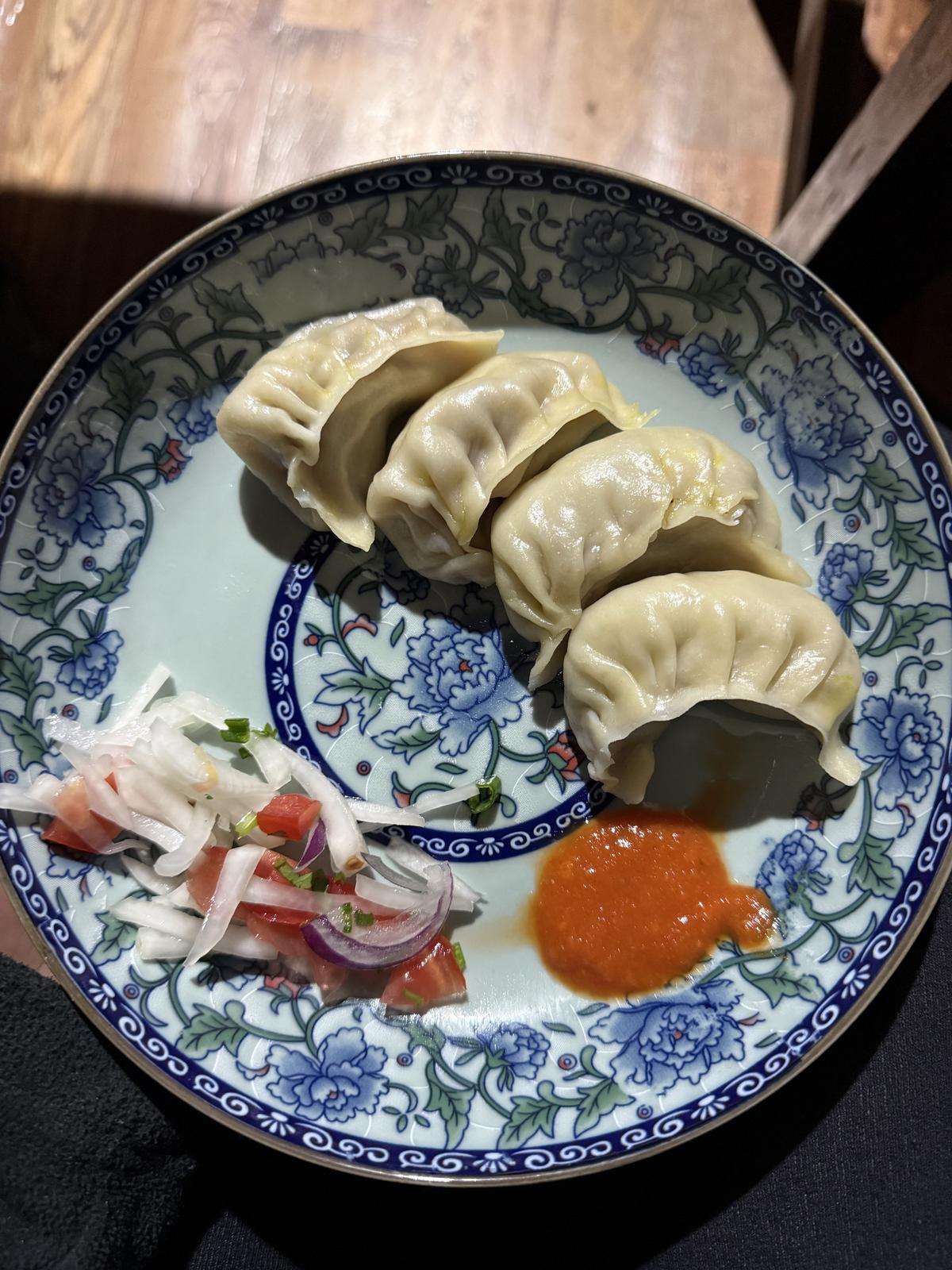 One of the many meals that involves the entire family in its preparation is momos. Served with a smashing dalle chutney.  