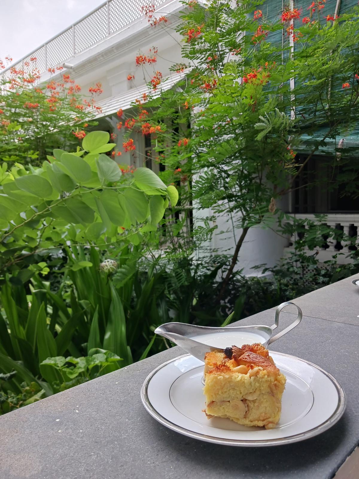 Bread butter pudding comes with a side of fresh cream