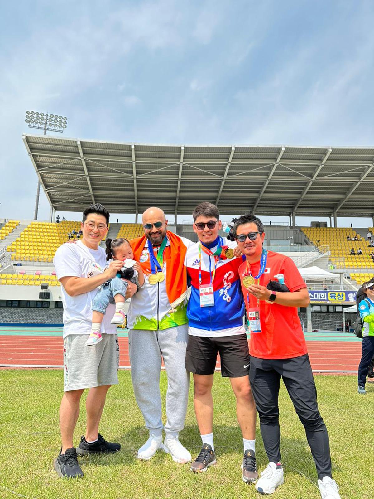 Naveen posing with his counterparts from different countries.