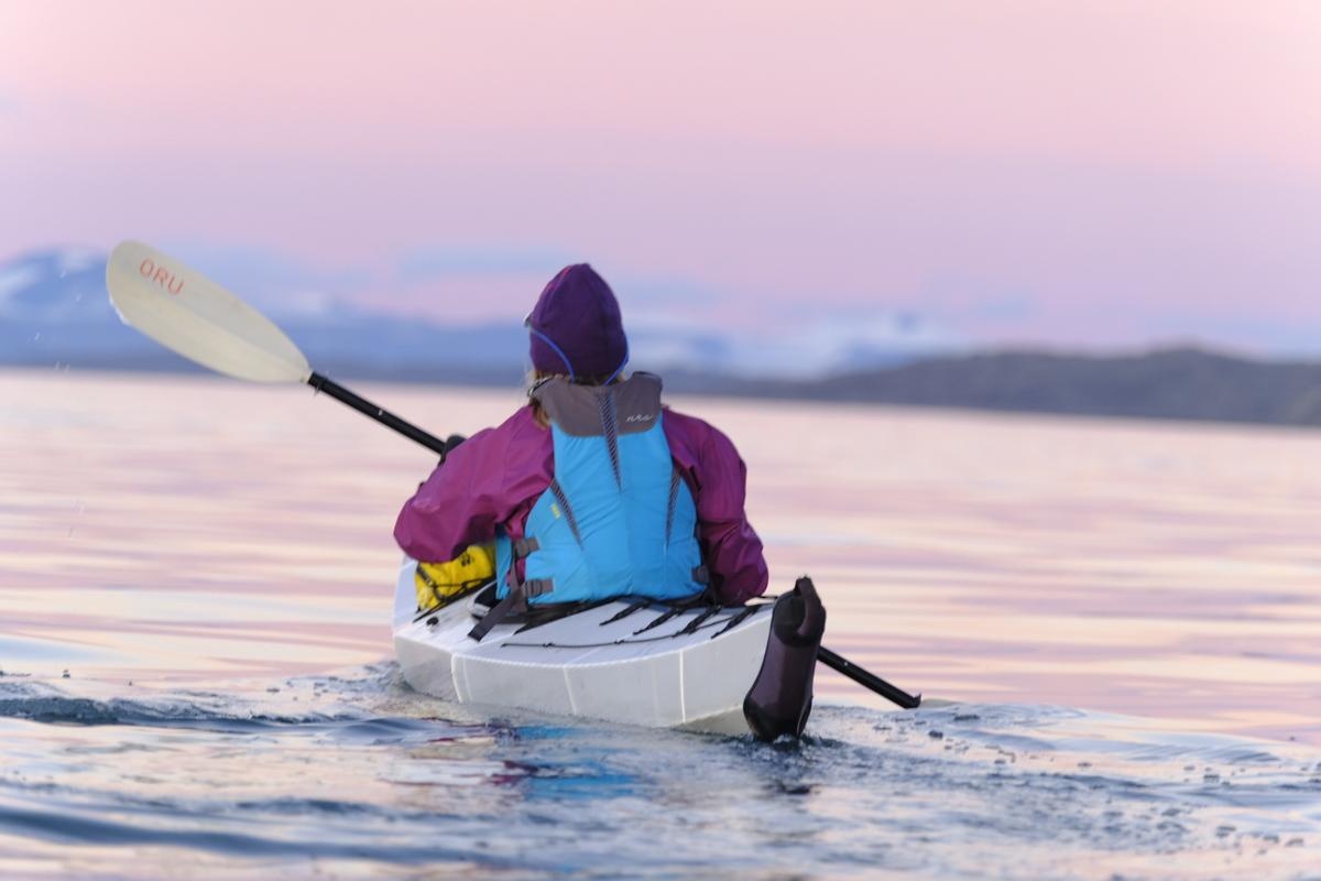 Hilde Fålun Strøm boating in Van Keulen Fjord (Van Keulenfjorden) in Svalbard.