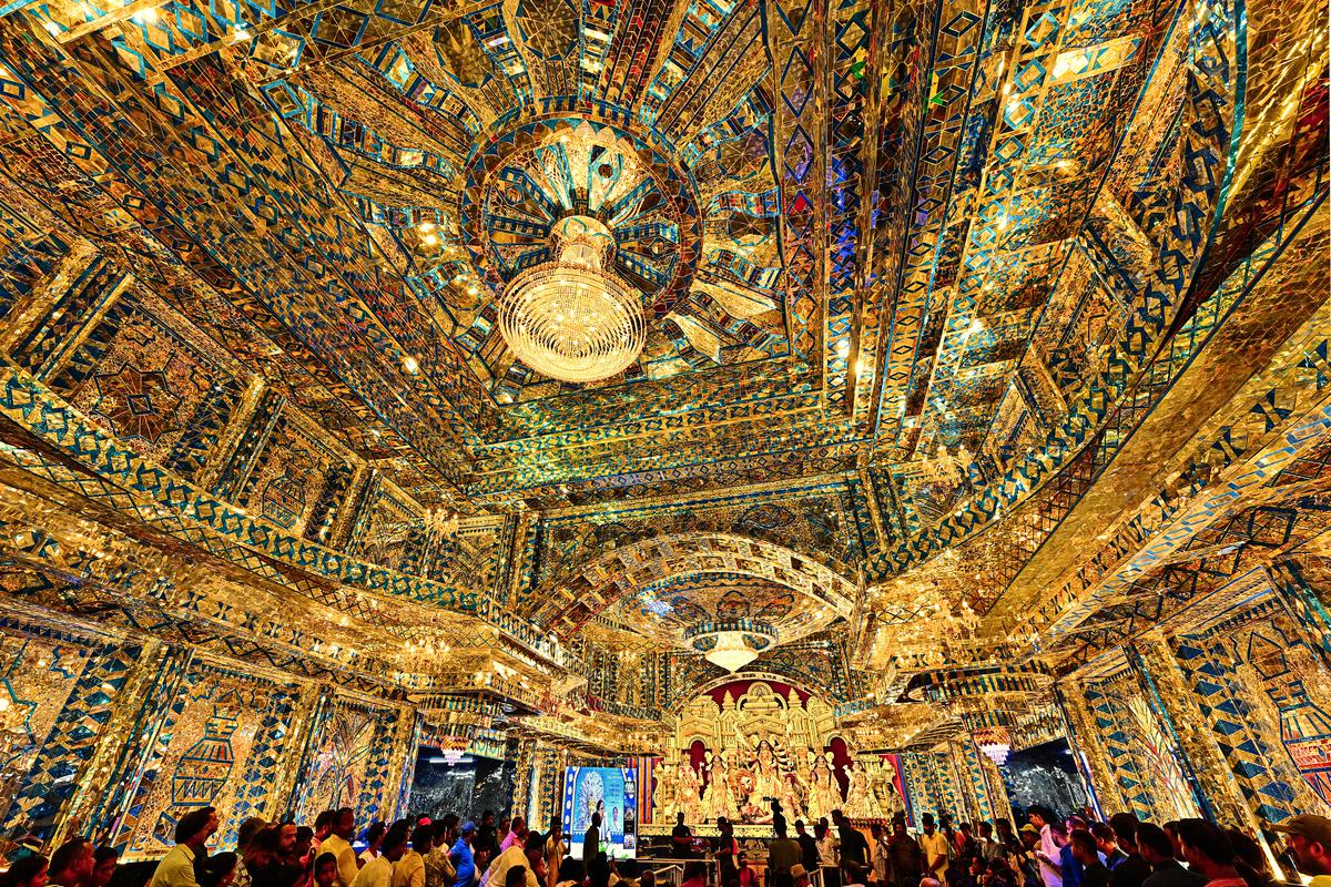 Luminous Club’s Grand Lisboa Hotel themed pandal’s glass interiors shine brilliantly in gold