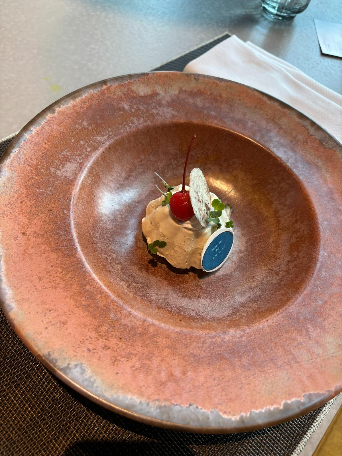 The dessert is inspired by panchamrit, signed off with the subtle sweetness of honey, milk and cinnamon The dessert is inspired by panchamrit, signed off with the subtle sweetness of honey, milk and cinnamon