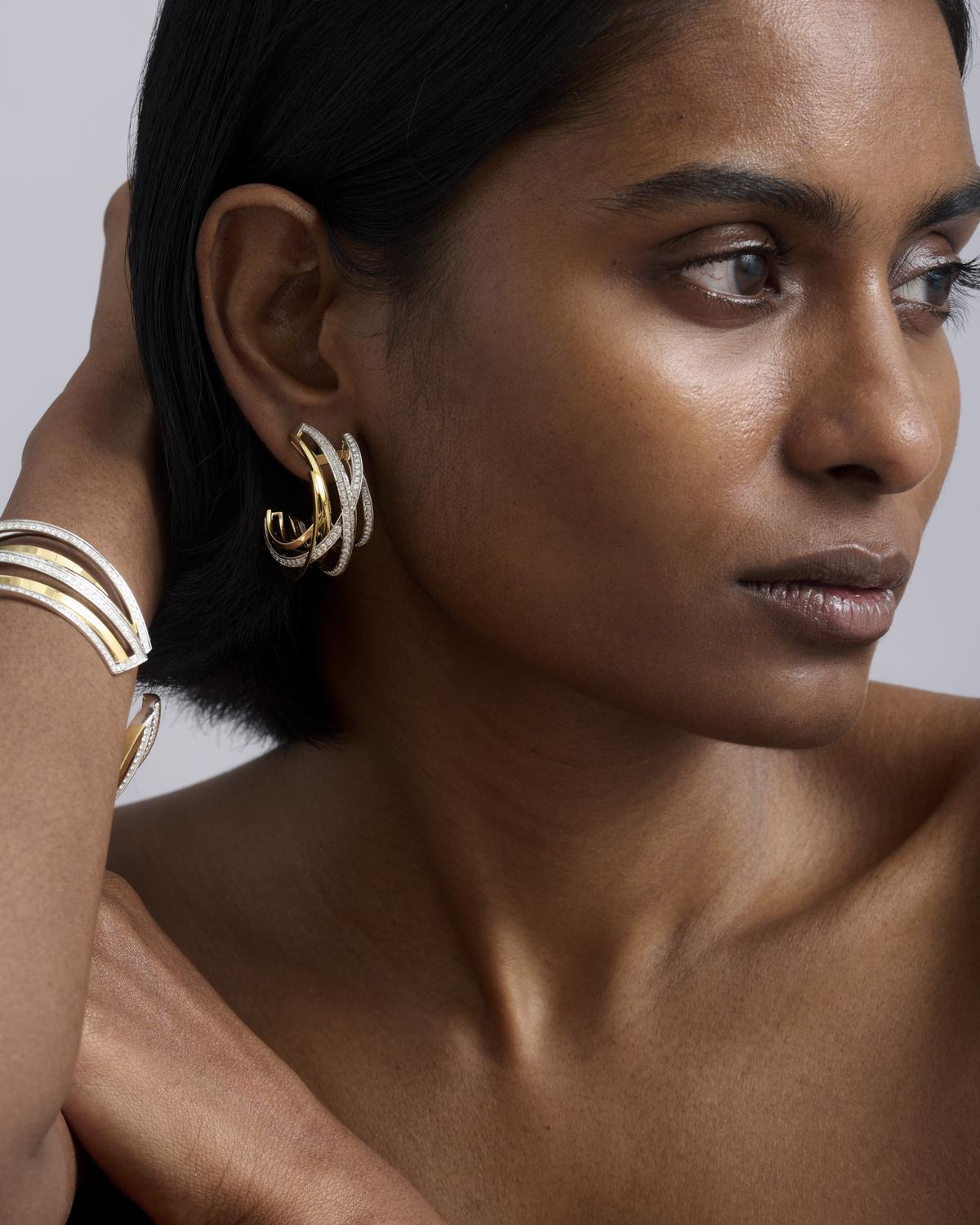 A model wears the weave hoops 